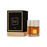 Khamrah Perfume Spray by Lattafa in elegant packaging, showcasing a luxurious scent of spices and sweetness.